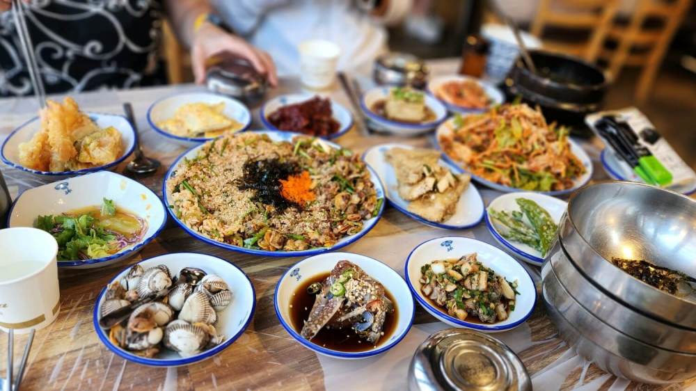 Spicy cockle salad (꼬막무침), a dish loved for its rich flavor, often considered a 밥도둑 (rice thief) in Korea.