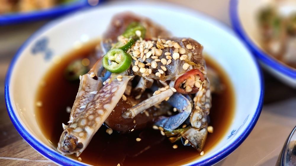 Soy sauce-marinated crabs (간장게장), known as a popular 밥도둑 (rice thief) dish in Korea.
