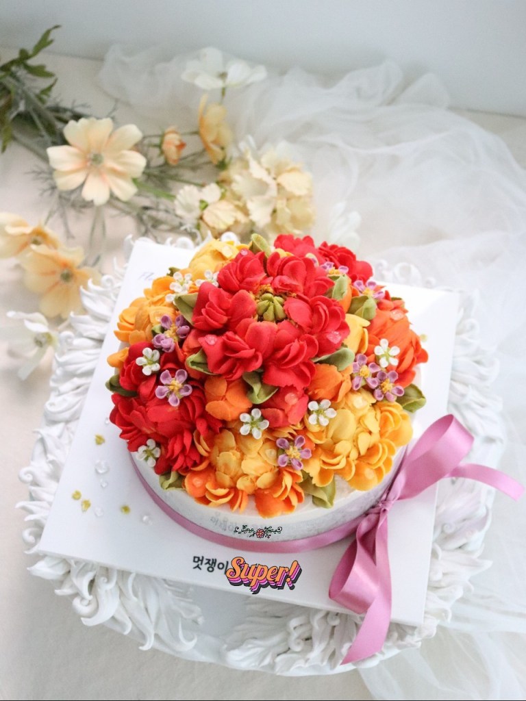 떡케이크 (Tteok Cake), a traditional Korean rice cake prepared for a family birthday celebration during the Chuseok holiday.