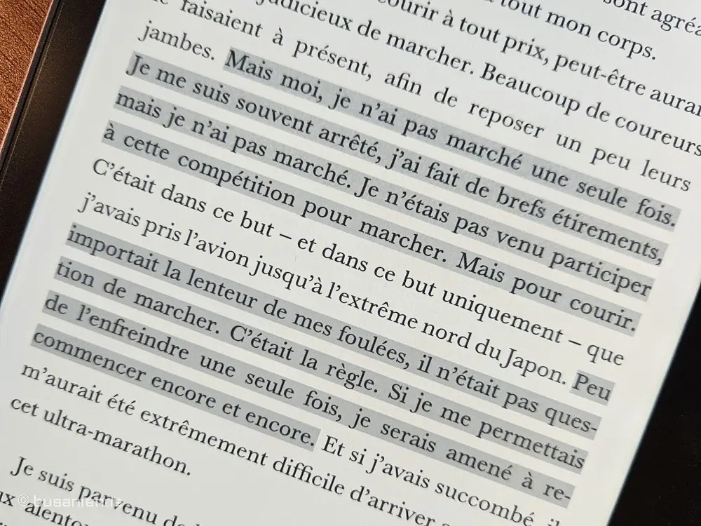 French quote from Murakami book about not walking during a marathon highlighted text